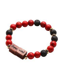 من معدن الإنسان سوار السنن الرواتب المكون من أحجار التركواز الأحمر الكريمة وأحجار بركانية سوداء مع مكعبين خشبيين